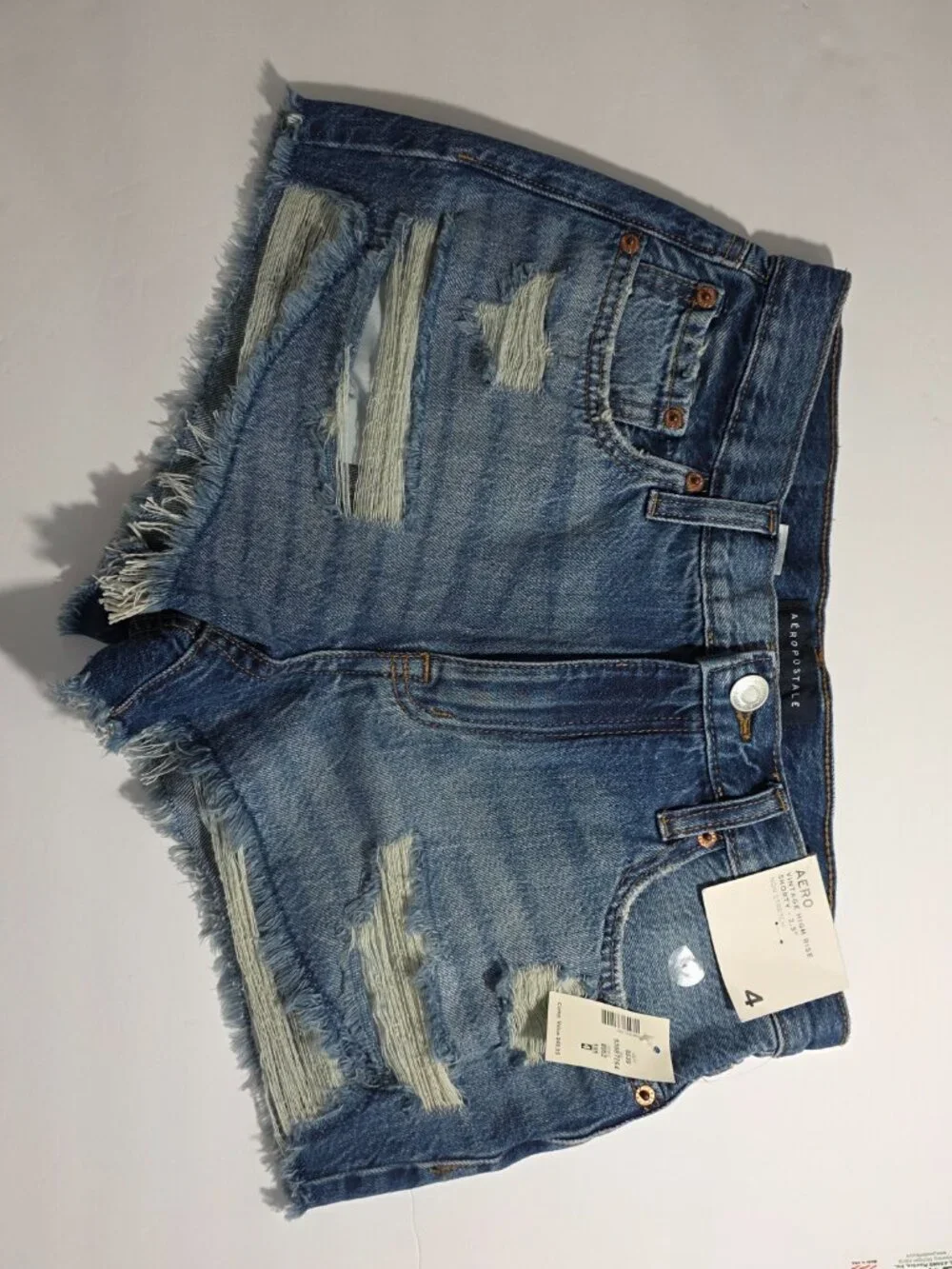 Aero High Rise Distressed Denim Shorty Shorts Size 4 NWT - Picture 2 of 8
